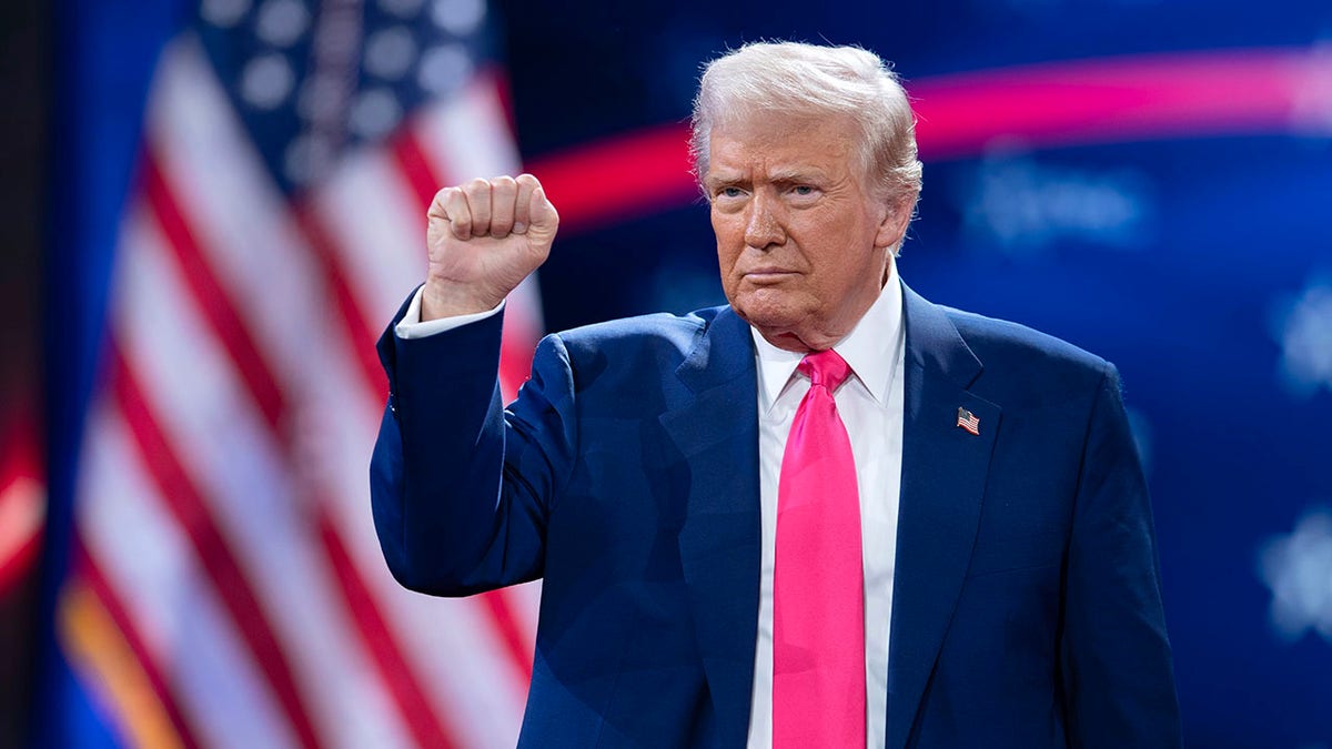 President Donald Trump gestures to the crowd at the Conservative Political Action Conference, CPAC, at the Gaylord National Resort and Convention Center, Saturday, Feb. 22, 2025, in Oxon Hill, Md. 