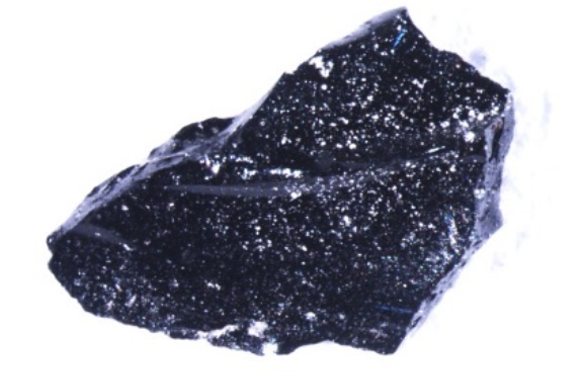 A sample of the organic glass, which resembles obsidian.