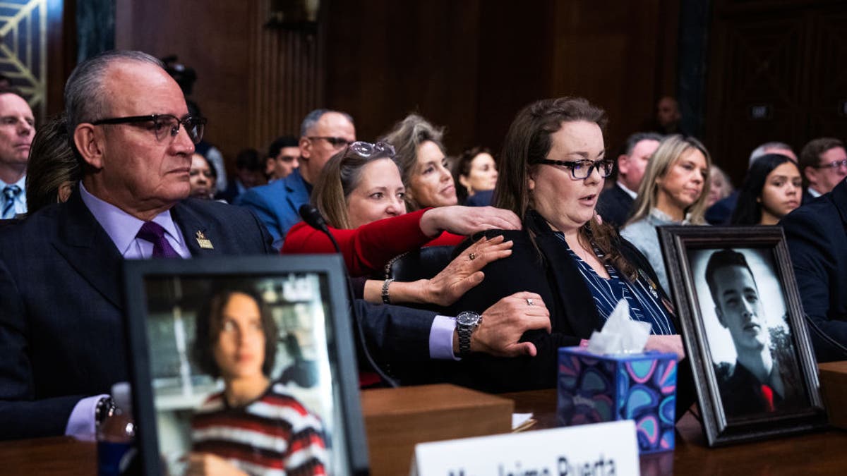 Bridgette Norring, right, whose son, Devin J. Norring, died in 2020 from a pill he thought was Percocet but was actually fentanyl, is comforted during the Senate Judiciary Committee hearing titled, "The Poisoning of America: Fentanyl, its Analogues, and the Need for Permanent Class Scheduling," in Dirksen building on Tuesday, Feb. 4, 2025. Jaime Puerta, president of Victims of Illicit Drugs, V.O.I.D., whose son Daniel died in 2020 from a fentanyl pill that he thought was OxyContin, appears at left. 