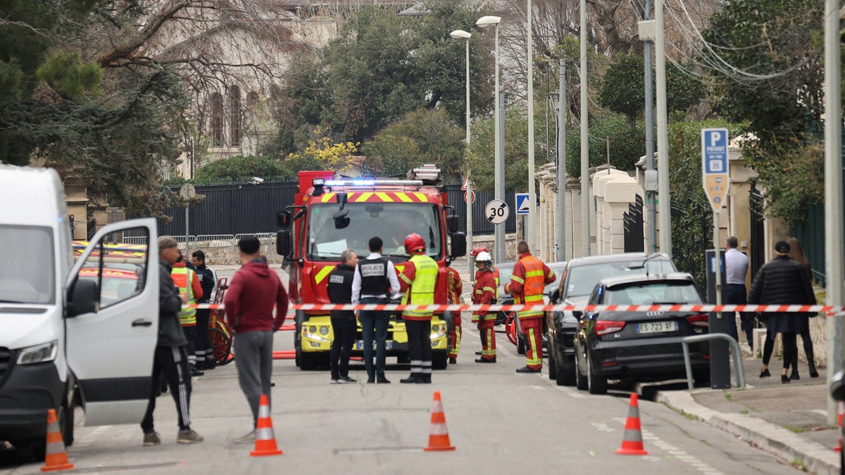 Firefighters, first responders outside Russian consulate in Marseille