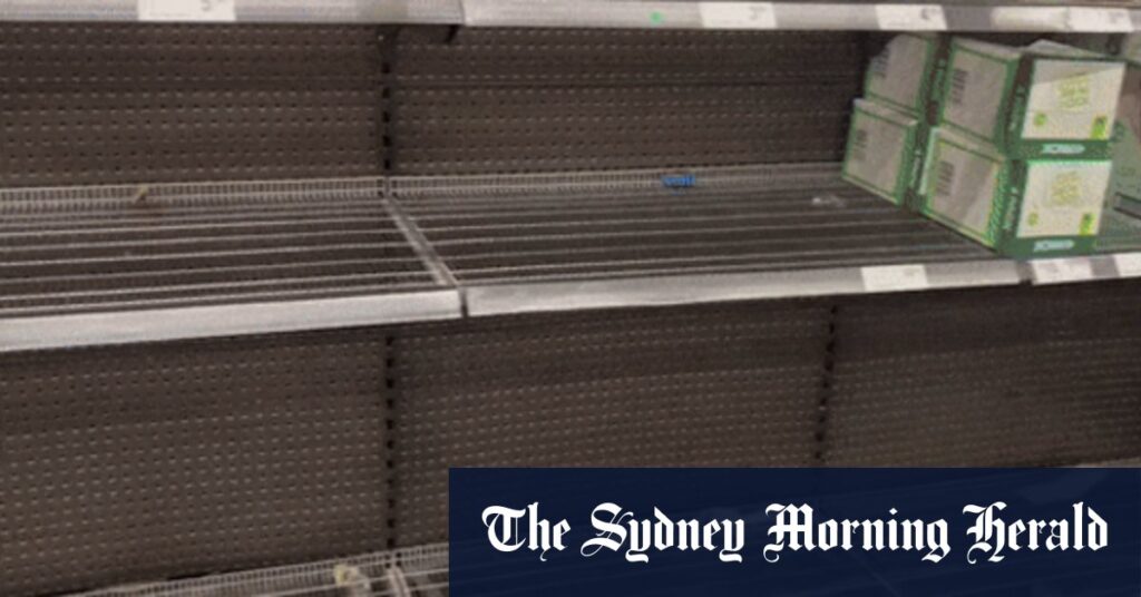 Panic buying in Brisbane as supermarket shelves stripped of bottled water, batteries, milk and bread