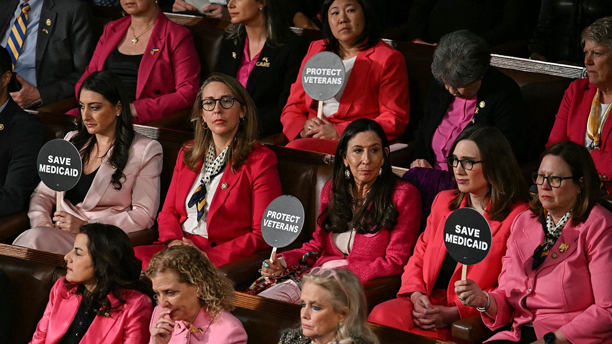 Democrats wear pink in protest of Trump's congressional address