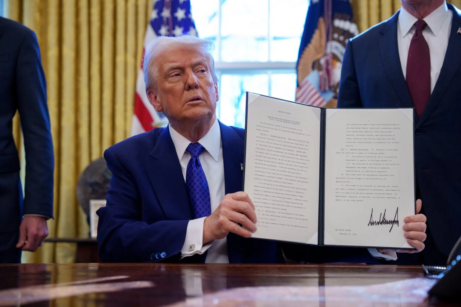 Trump undoes stack of ‘harmful’ Biden executive orders, shrinks multiple agencies