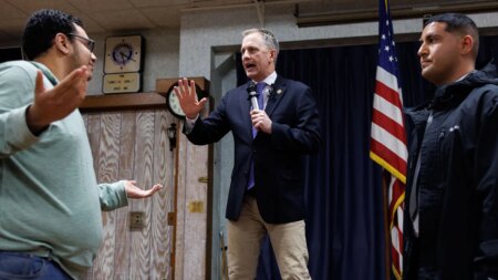 ‘Soulless piece of crap’: Angry protester jumps on stage during Dem rep’s town hall