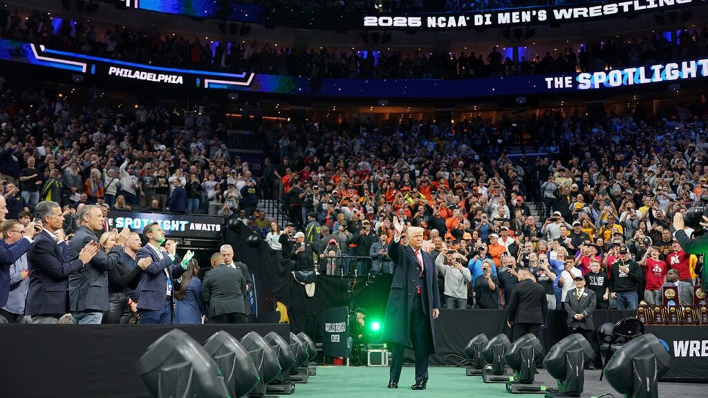 Trump receives raucous welcome at NCAA wrestling championships: Champ is here