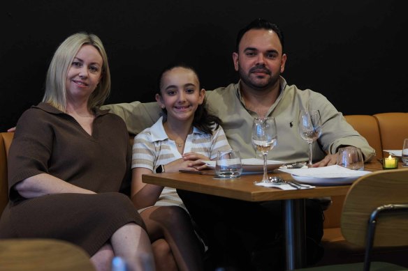 Raj Sharma with his wife and daughter.