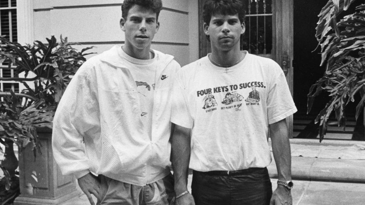 Menendez Brothers in a black and white photo outside their Beverly Hills home