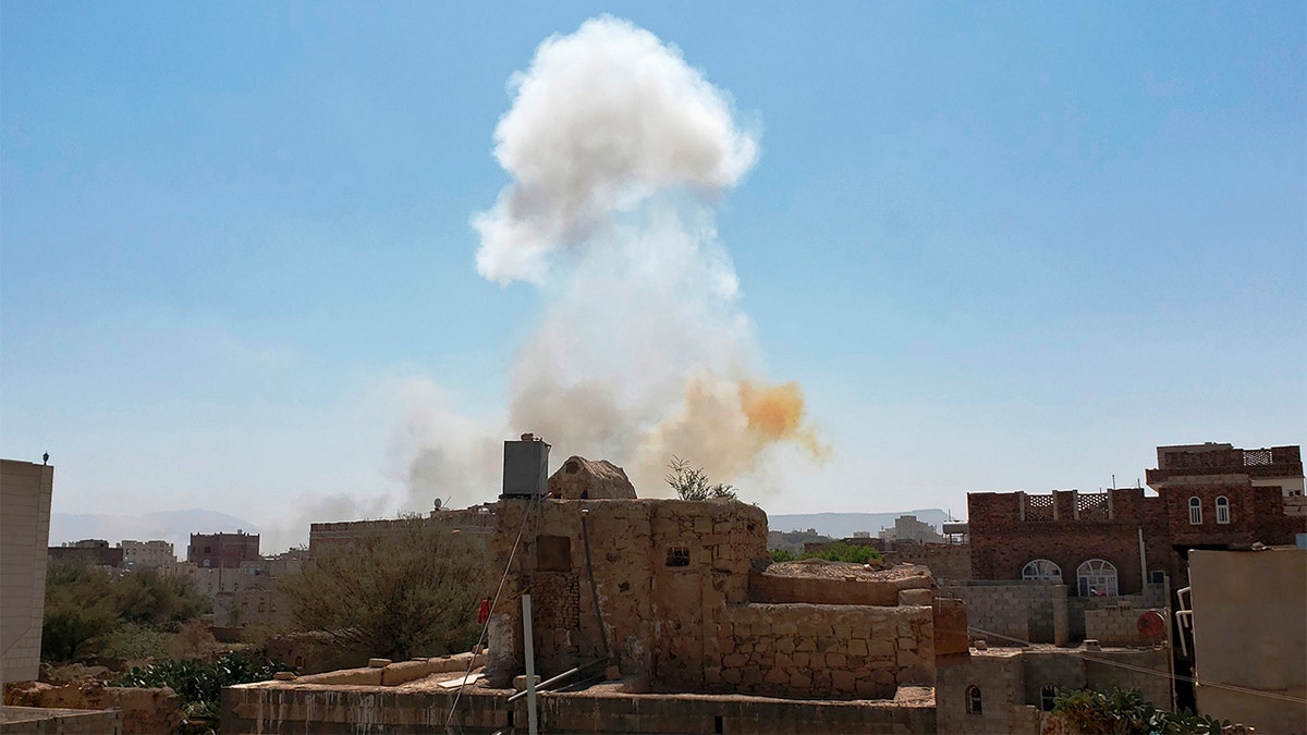 Smoke rises after Saudi-led airstrikes on an army base in Sana'a, Yemen, on March 7, 2021.