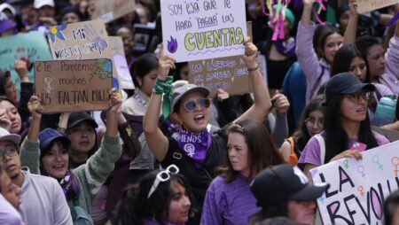 Protesters rally on International Women’s Day, fearing far right