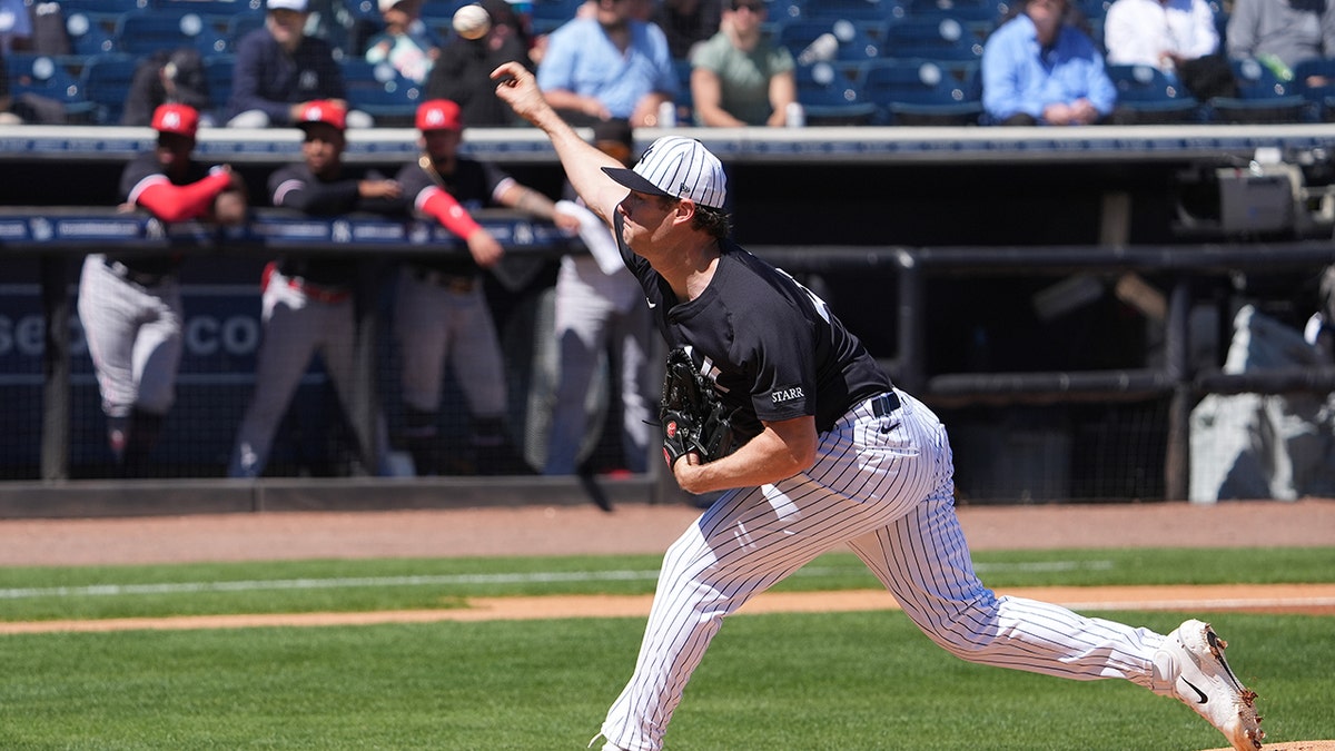 Gerrit Cole throws