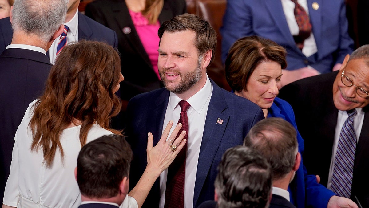 Representative Nancy Mace, a Republican from South Carolina, and US Vice President JD Vance speak while arriving for a joint session of Congress in the House Chamber of the US Capitol in Washington, DC, US, on Tuesday, March 4, 2025. Donald Trump's primetime address Tuesday night from Capitol Hill, billed as a chronicle of his "Renewal of the American Dream," comes at a critical juncture early in his second term, as voters who elected him to tackle inflation and improve the economy are beginning to weigh the impact of his agenda. Photographer: Al Drago/Bloomberg via Getty Images