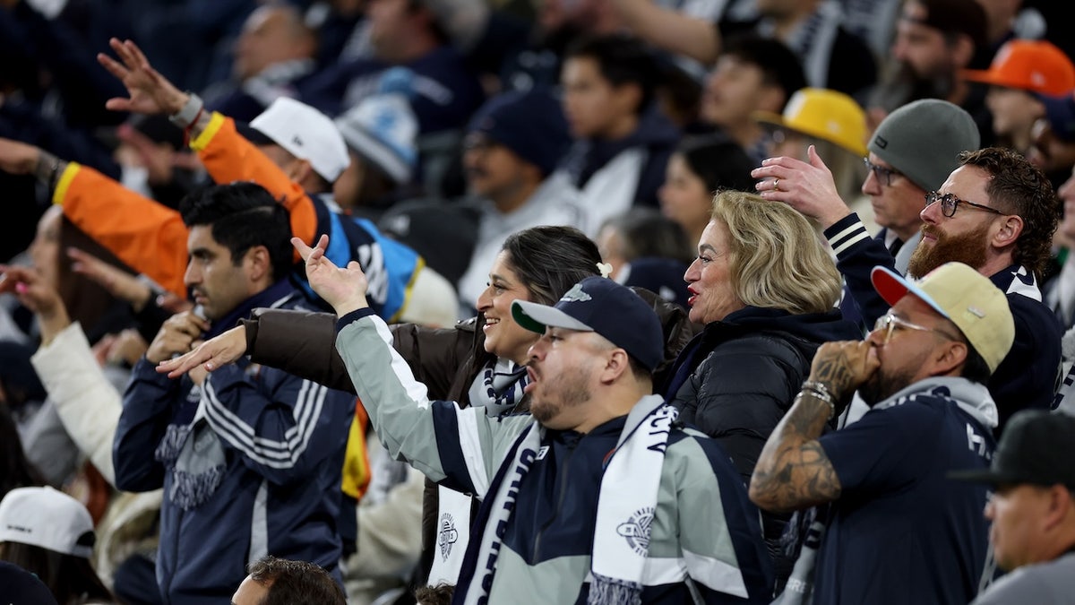 Fans cheer during a game between the San Diego FC