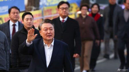 South Korea’s President Yoon free, trials continue after court quashes detention