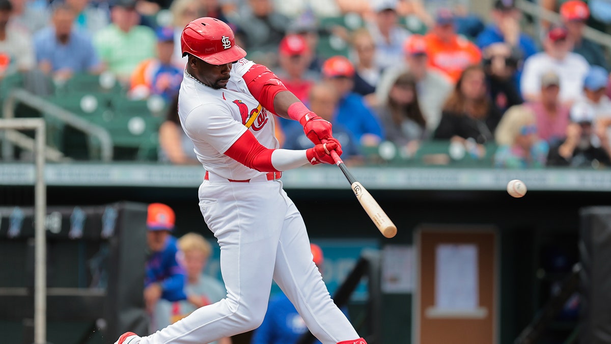 Jordan Walker hits during a game