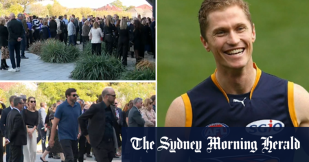 AFL community gathers for funeral of Adam Selwood