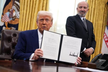 Trump’s First 100 Days Fuels An Economic Debate: Strategy Or Chaos?