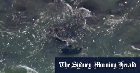 Three people rushed to hospital after helicopter crashes into waters near Victorian peninsula
