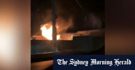Firefighters rescue woman from devastating house fire