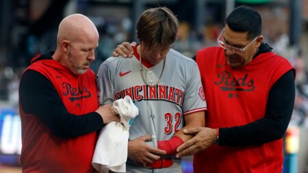 Reds rookie Tyler Callihan breaks arm crashing into wall while trying to make diving catch