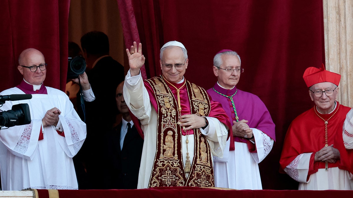 Pope Leo XIV greets faithful from balcony