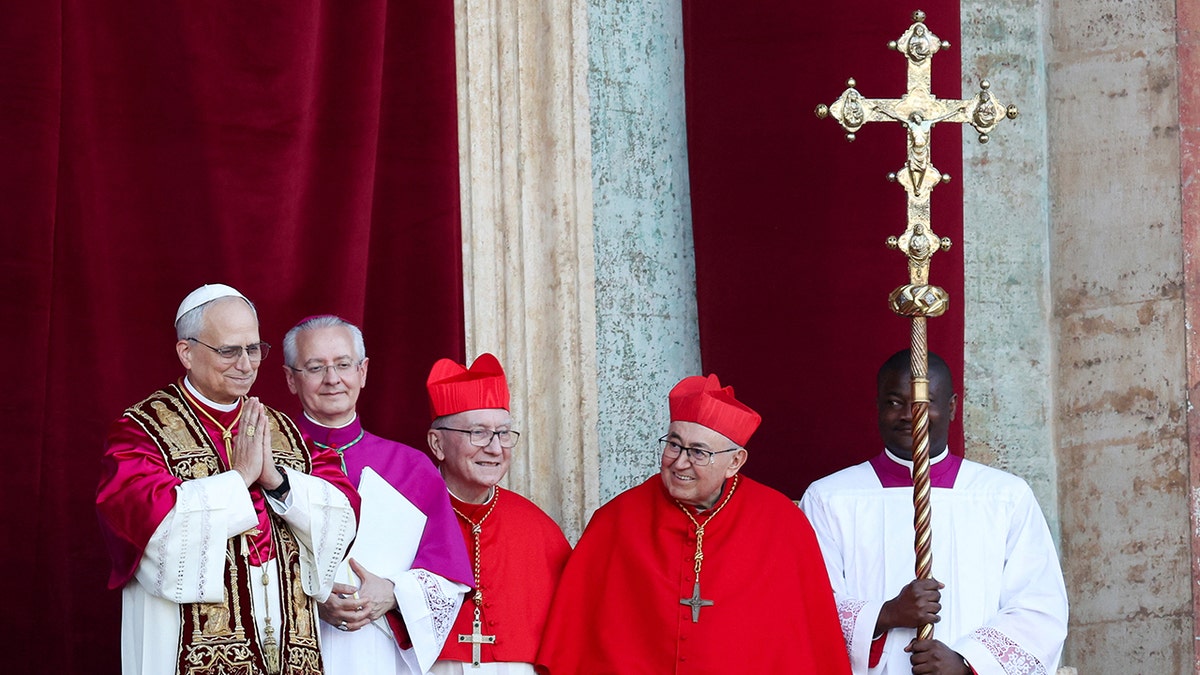 Pope Leo XIV smiling at crowds in St. Peter's Square