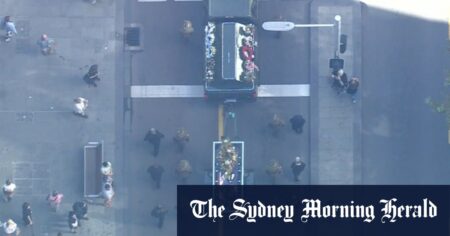 Thousands join military procession for funeral of Western Australia’s last WWII POW