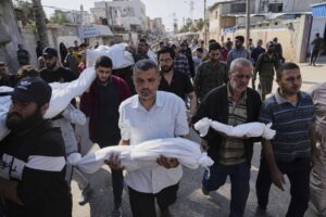 At least 82 killed in Israeli strikes on Gaza as critical aid fails to reach Palestinians