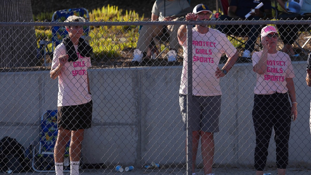 Spectators wear Protect Girls Sports shirts during the CIF Southern Section Division 3 Track and Field preliminaries at Nathan Shapell Memorial Stadium at Yorba Linda High School on May 10, 2025 in Yorba Linda, California.