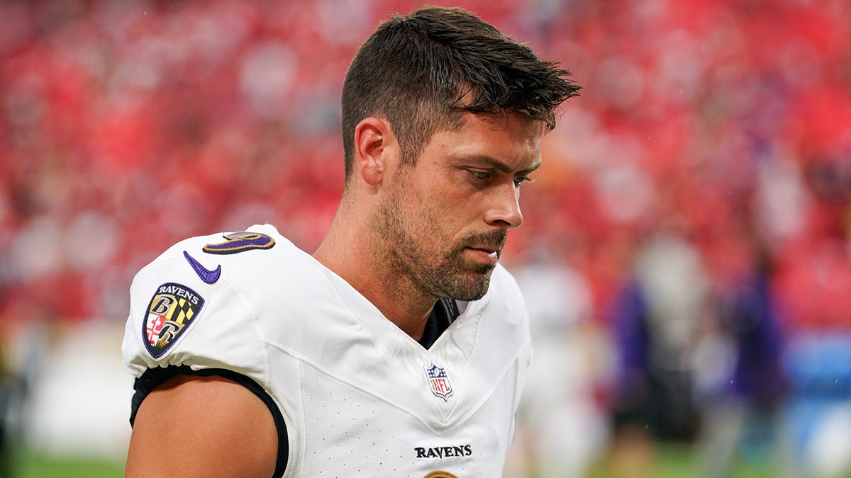 Justin Tucker leaves the field