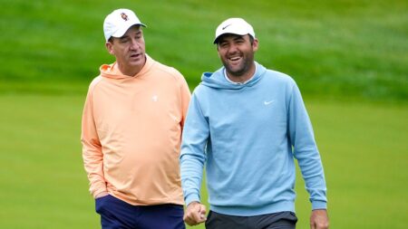 Scottie Scheffler breaks out in laughter after Peyton Manning’s errant tee shot reportedly hits house