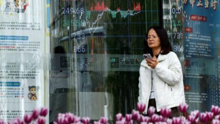Asian markets rebound to track Wall Street up as China cuts rates
