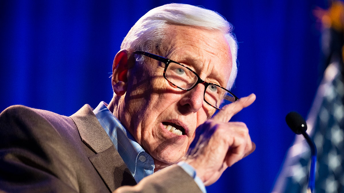 Steny Hoyer speaking at a microphone while pointing