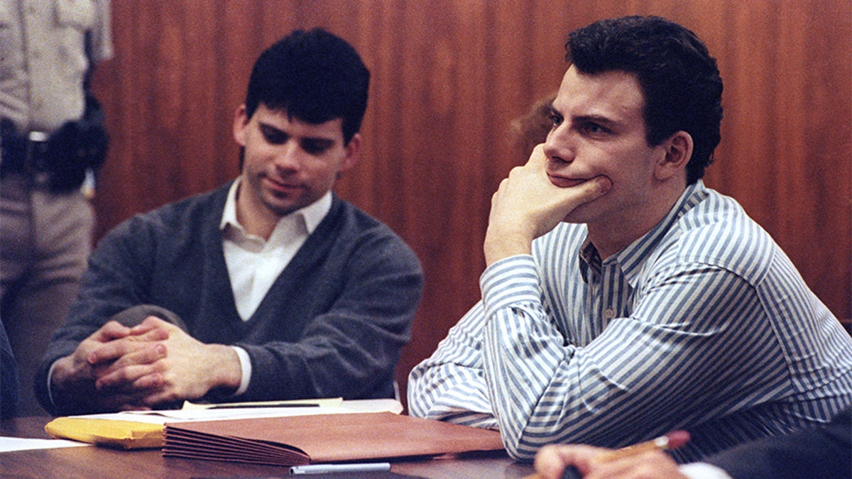 Erik Menendez (R) and brother Lyle listen to court proceedings during a May 17, 1991 appearance in the case of the shotgun murder of their wealthy parents
