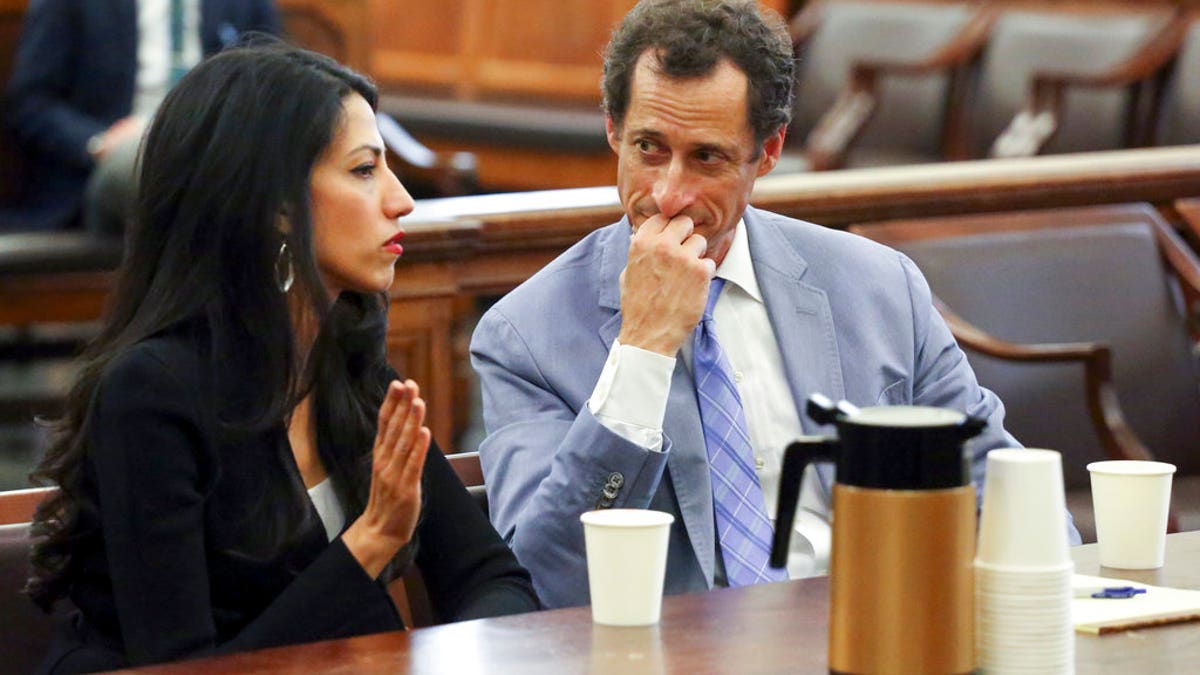 Anthony Weiner, right, and Huma Abedin appear in court in New York on Wednesday, Sept. 13, 2017. The couple asked a New York City judge for privacy in their divorce case. (Jefferson Siegel/The Daily News via AP, Pool)