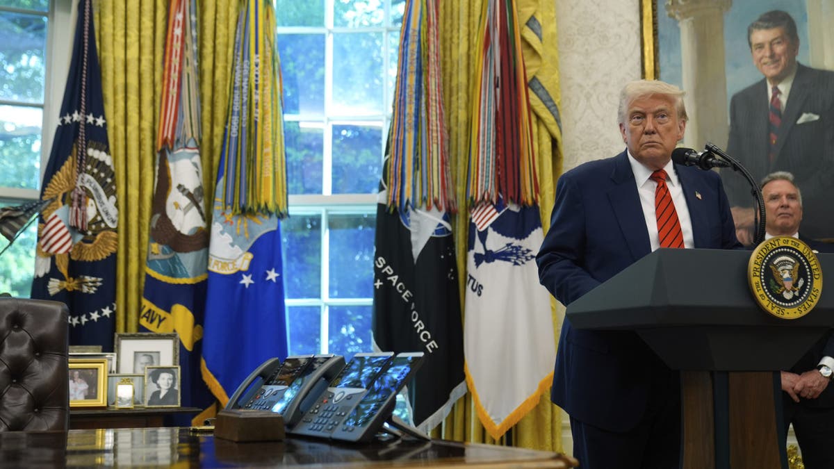 Trump at lectern in Oval Office