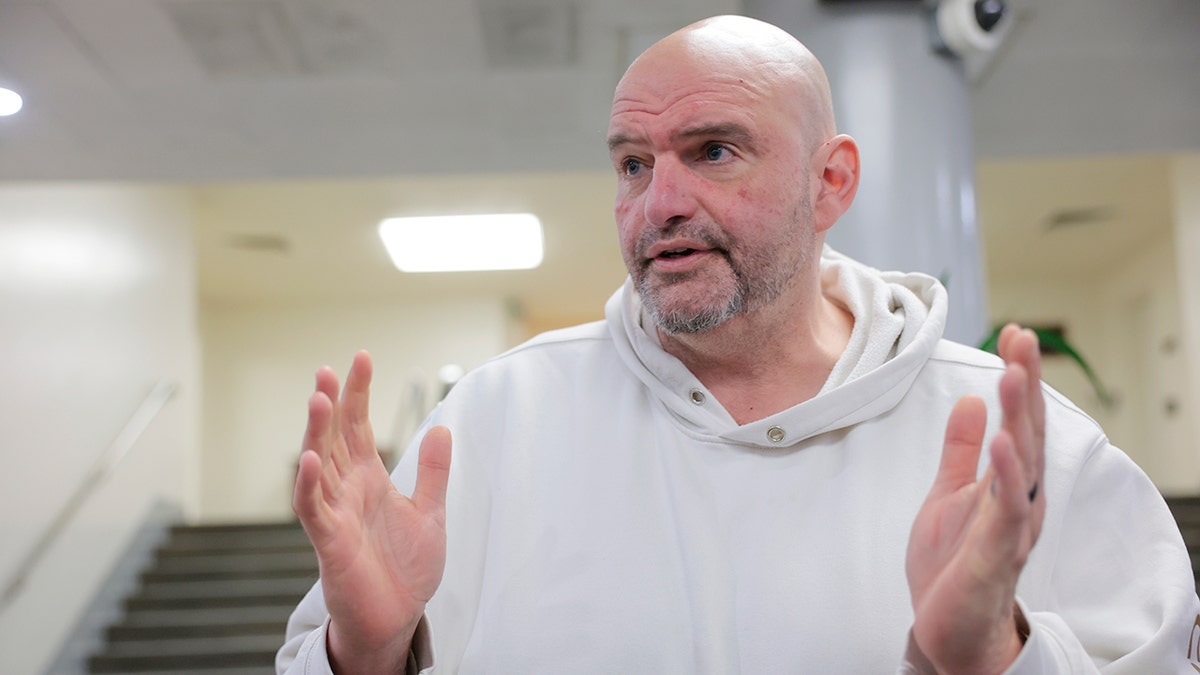 Sen. John Fetterman wearing a white hoodie