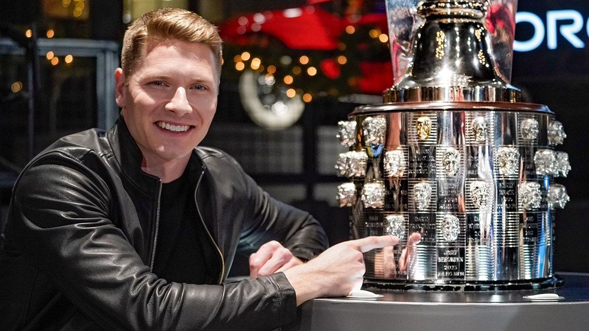 Josef Newgarden poses