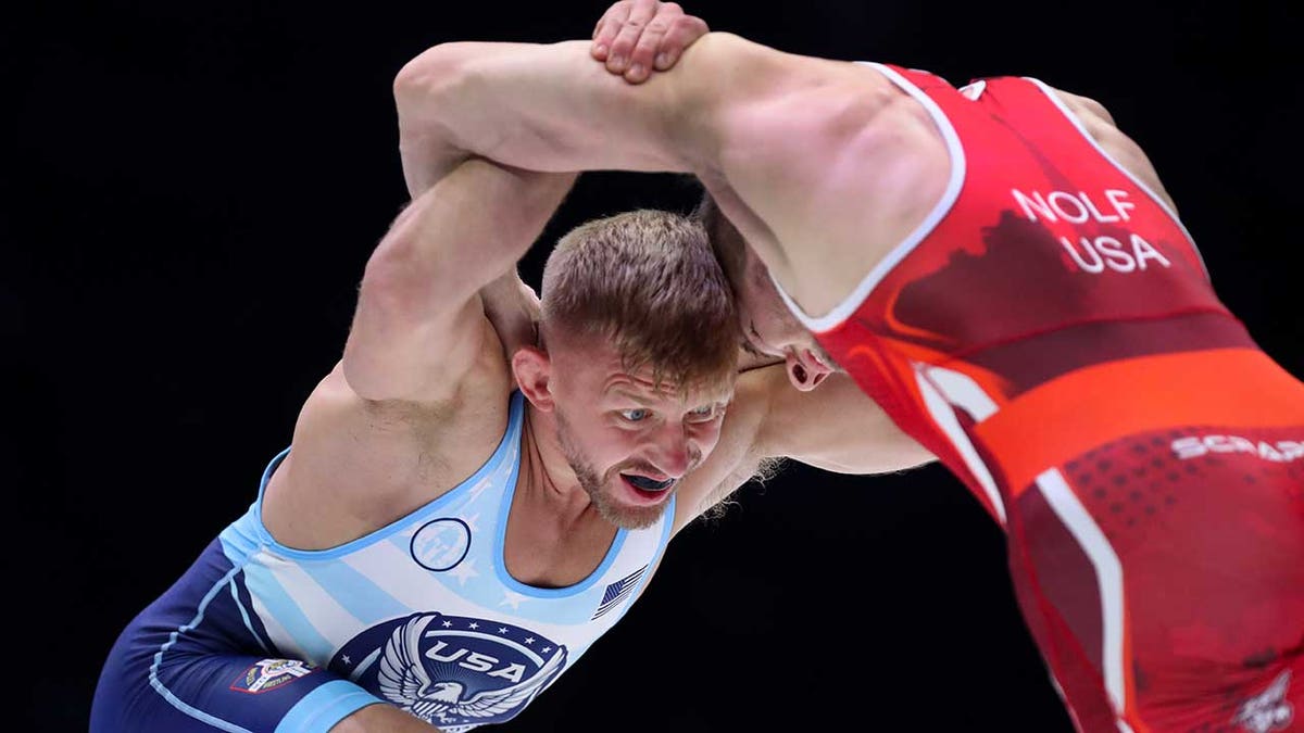 Kyle Dake locks up with Jason Nolf