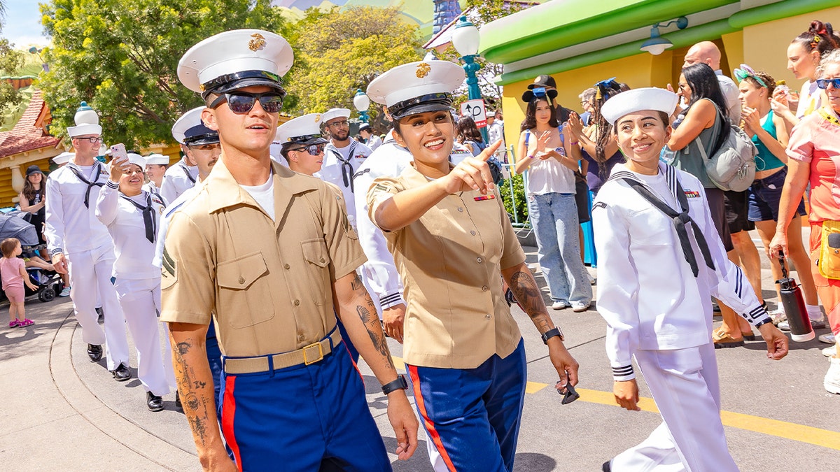 U.S. Navy sailors and Marines enjoy a day at DIsneyland
