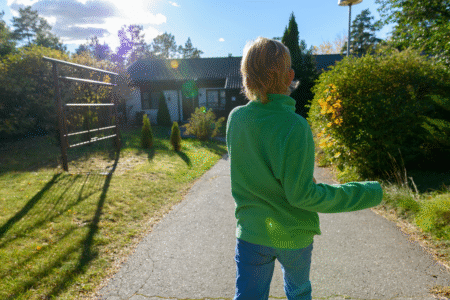 Neighbor Cheered for Confronting Mom Over What Her Son Did in the Backyard