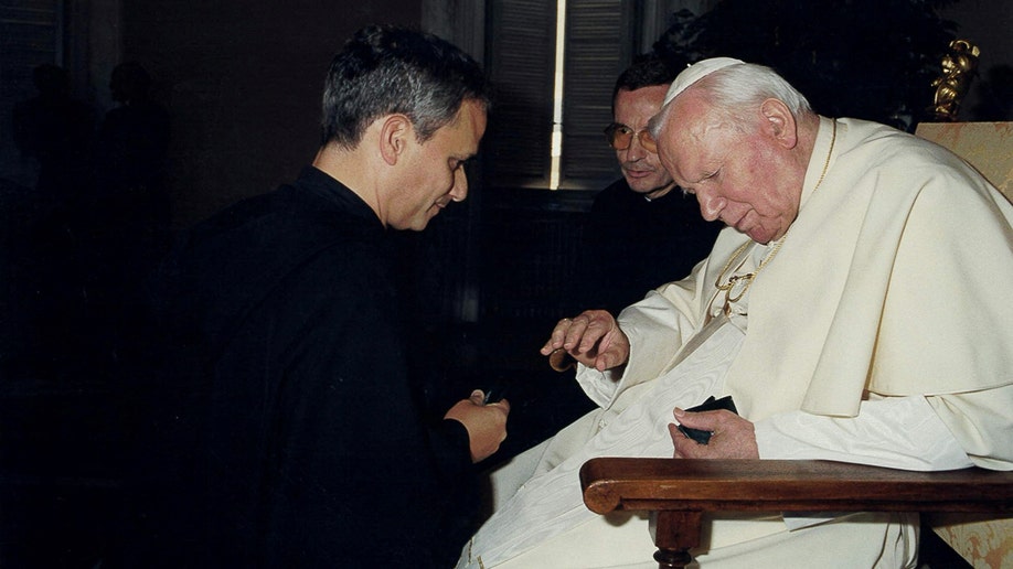 Pope John Paul II meets the future Pope Leo XIV