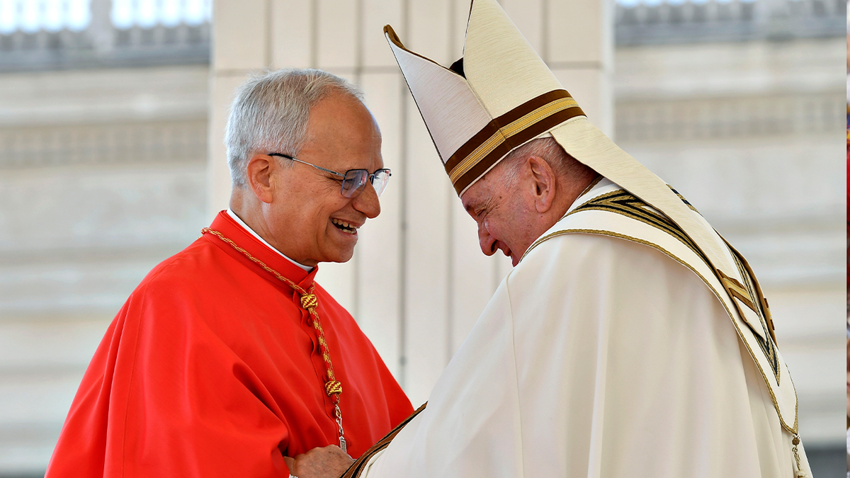 Pope Francis with then Cardinal Robert Prevost