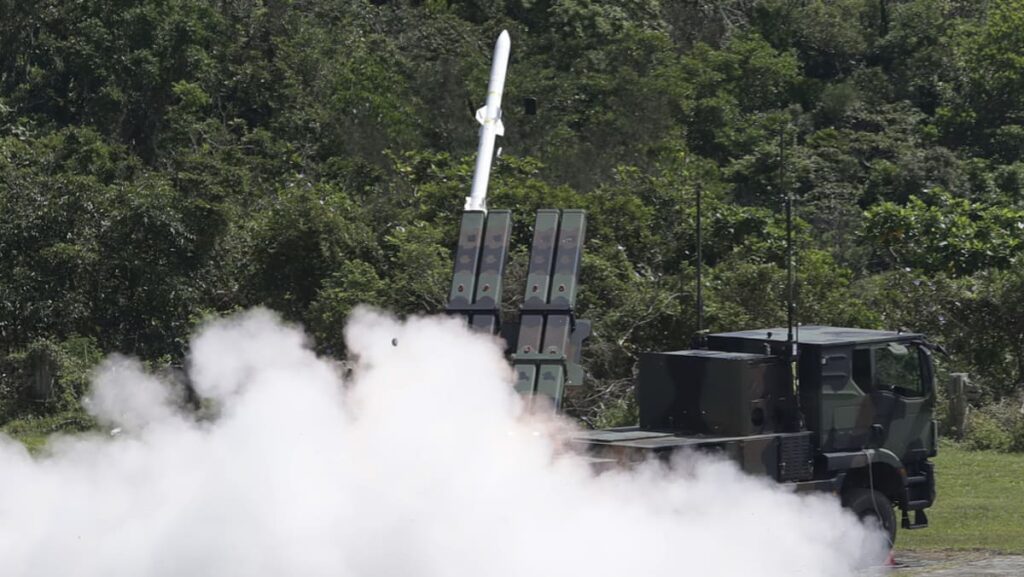 Taiwan president pledges peace with China but says island must strengthen defences