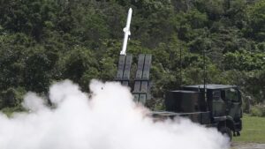 Taiwan president pledges peace with China but says island must strengthen defences