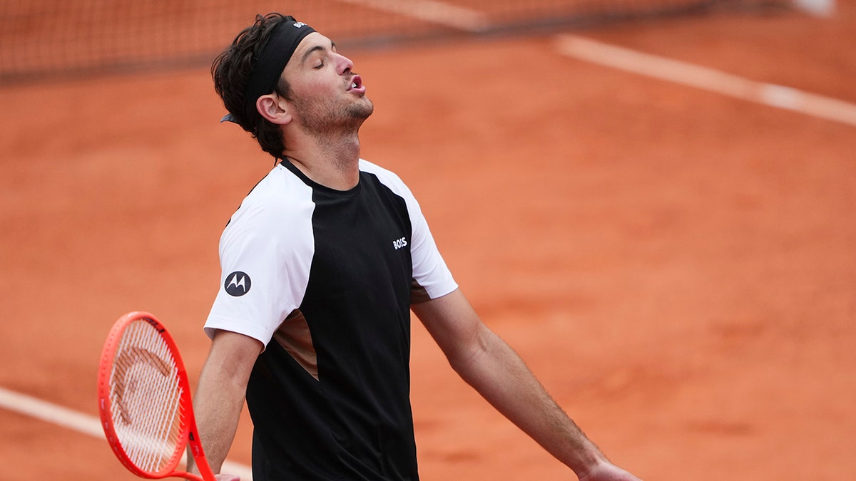 Taylor Fritz reacts
