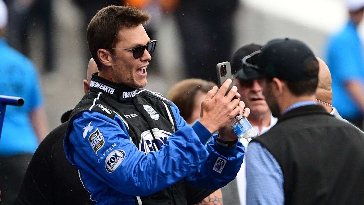 Tom Brady takes a pic