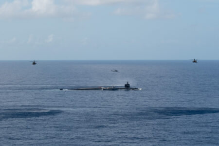 Photos Show US Helicopters Escorting Nuclear Submarine
