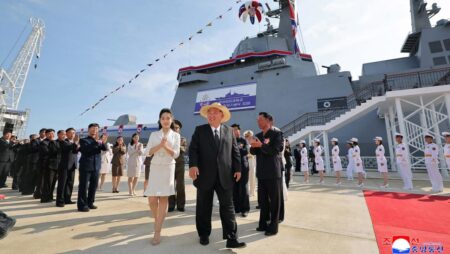 North Korea launches repaired destroyer, Kim vows two more to come