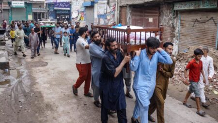 Pakistan flash floods and heavy rains kill 24