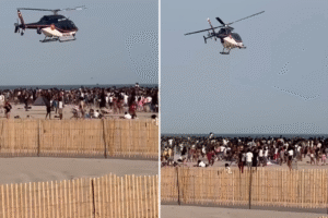 Senior skip day at Jones Beach ends in chaos as police helicopter descends on brawling horde of high schoolers: video